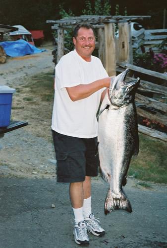 D&D Fishing Charters Guide, Doug Ferrier, with his 62.55 lb Chinook Salmon